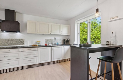 Fur House | This tasteful and spacious vacation home with a large terrace welcomes you to the island of Fur.