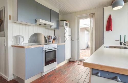 Næs House | This two-story stone and wooden house has been recently renovated.
