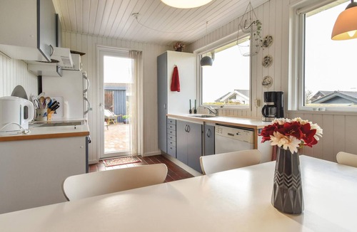 Næs House | This two-story stone and wooden house has been recently renovated.