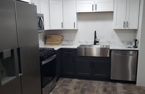 Pocahontas House | This updated home has 4 bedrooms and 2 full baths. Close to shopping and dining!