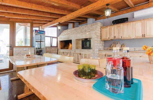 Kastel Novi House | This vacation home is spread over three floors, connected by a covered outdoor staircase.