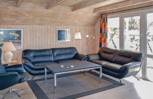 Henne Strand House | This vacation home with pool and sauna at Henne Strand enchants with its proximity to the best swimm