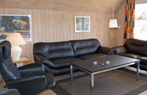 Henne Strand House | This vacation home with pool and sauna at Henne Strand enchants with its proximity to the best swimm