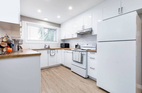 Lafleche Condo | Three bedroom apartment, Free parking. EV charger.