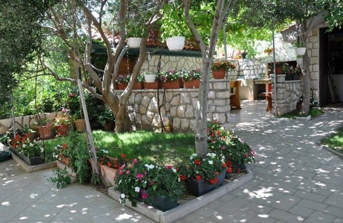Lopar Apartment | Three bedroom apartment with terrace and sea view Lopar, Rab (A-23747-a)
