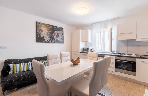 Lopar Apartment | Three bedroom apartment with terrace and sea view Lopar, Rab (A-14070-d)
