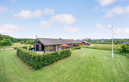 Krejbjerg House | Three-Bedroom Holiday Home With A Fireplace In Ejstrupholm