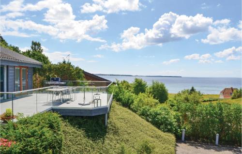 Handrup Strand House | Three-Bedroom Holiday Home In Ebeltoft