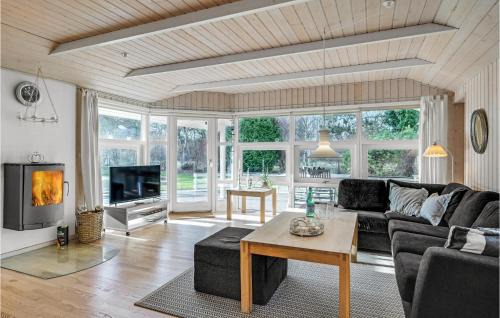 Melby House | Three-Bedroom Holiday Home With A Fireplace In Melby
