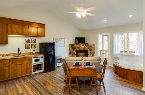 Montebello Apartment | Three Ridges Cabin-kitchen, fireplace, jacuzzi