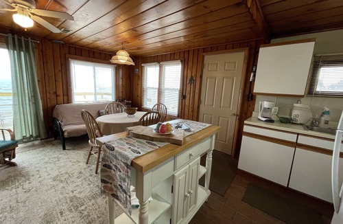 Oscoda Cabin | Three bedrooms with kitchen and a huge deck.