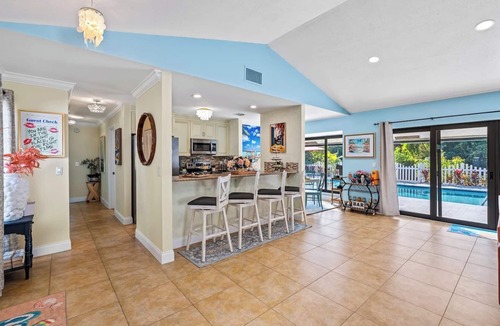Tropic Palms House | Tiki Hut, Htd Pool, Billiards, Putt-Putt, Canal