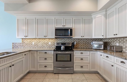 Palm Coast House | Tiki Tides Oceanfront 7BR w/ Elevator, Heated Pool & Private Boardwalk