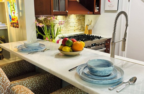 Ansonborough Condo | Timeless Charleston Charm: Cozy 1807 Haven with Fire Glow & Private Patio Dreams