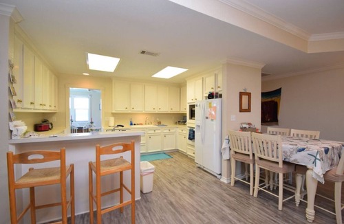 Crystal Beach House | Tiny Bubbles -Hot Tub-Screened Game Room-Spacious Decks-EV Charger