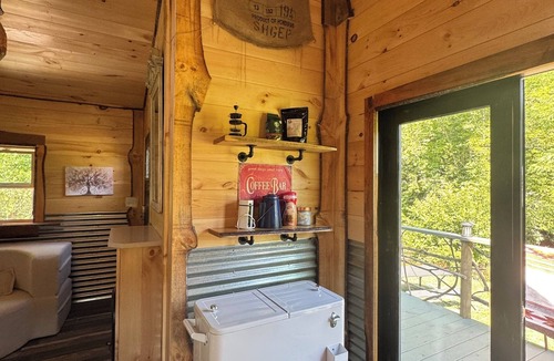 Hillsville Cabin | Tiny cabin sits by a bubbling, stocked creek. Pet friendly for a fee, hot tub