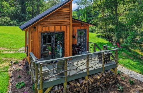 Hillsville Cabin | Tiny cabin sits by a bubbling, stocked creek. Pet friendly for a fee, hot tub