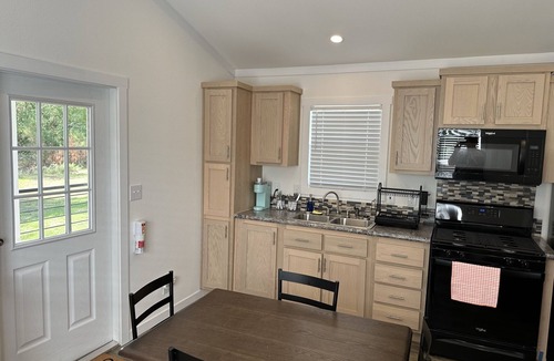 New Caney Cottage | Tiny Home Big Amenities: pool/hot tub, laundry, camp store, near Houston