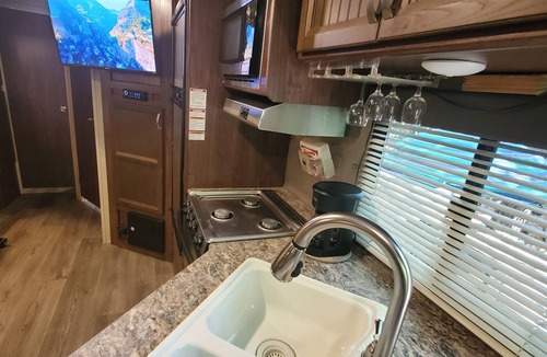 Comfort Apartment | Tiny house (studio) and camper in campsite, accommodates 6 people total!