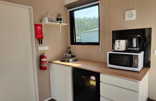 Buchan House | Tiny Retreat by the River by Tiny Away