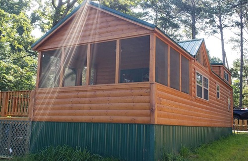 Negreet Cabin | Tiny Toledo - Lakefront Cabin with Boathouse, Fishing Pier, and DRAMATIC Sunsets