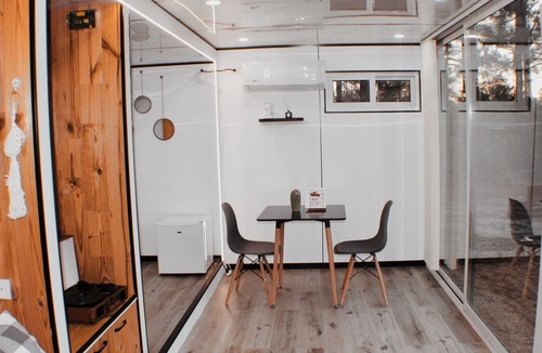 Athens Cabin | Tiny White Box on Off-grid Land. Queen size bed