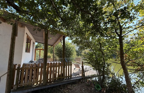 Champsac House | Tinyhouse on Bramefort Pond with Private Terrace and Nature Views