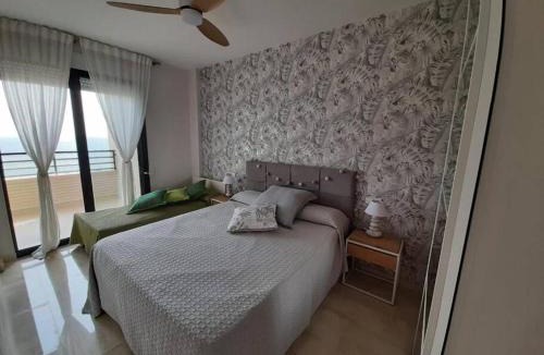 Villajoyosa Apartment | Top-Floor Beachfront Apartment with Parking, Pool, & Spacious Sea-View Balcony