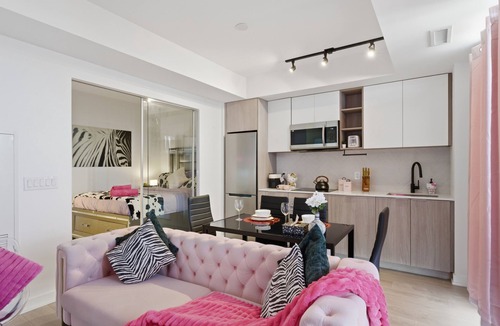 The Queensway Condo | Toronto Skyline View Condo with Parking, Sauna & Gym