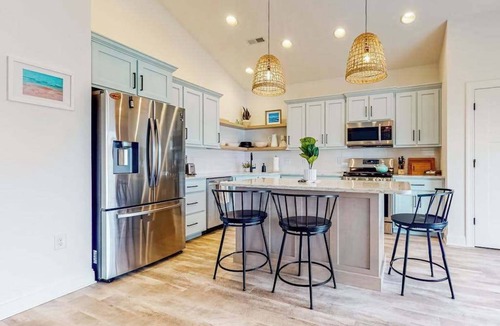 South Bethany Harbor House | Town of South Bethany canal-front home with dock & decks - two blocks to beach