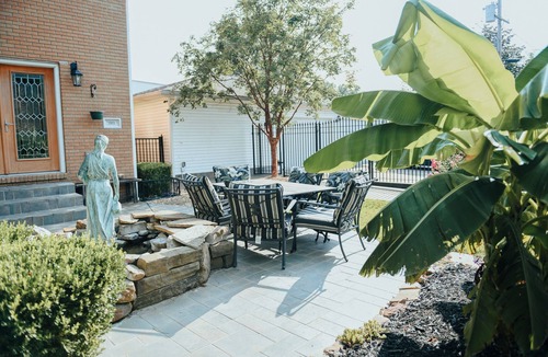 Joplin House | Townhome with Botanical Garden, Pond, Pool Access, Arcade, and Theater