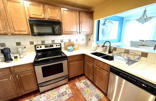 Carmody House | Townhome with Dedicated Workspace, WIFI, Garage