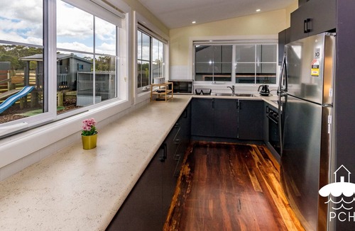 Fish Creek House | Tractor Summary: Styl