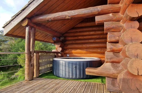 Saint-Sauveur-Camprieu Ski Chalet | Traditional log cabin with Jacuzzi and wooded garden in the Cévennes