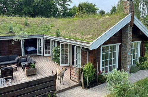 Udsholt Sand House | Traditional Viking house near Rågeleje beach