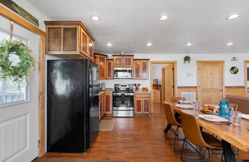 Bryant Cabin | Trails End Cabin with a hot tub, fire pit, & indoor pool!