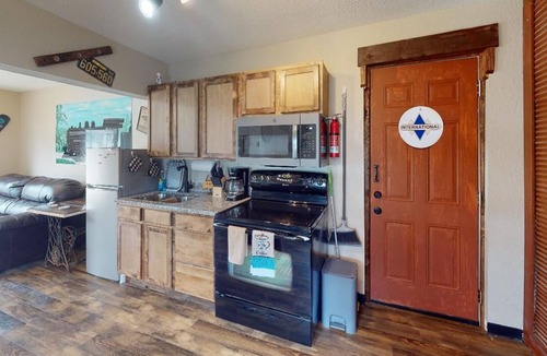Neosho Apartment | Train Themed Accommodations Near Neosho Square! Side B