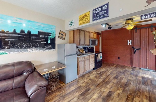 Neosho Apartment | Train Themed Accommodations Near Neosho Square! Side B