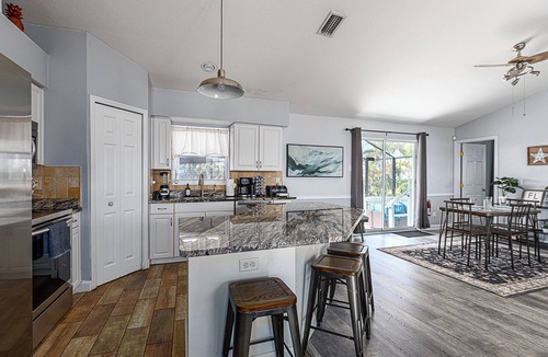 Jacarandas House | Tranquil 6-bedroom house with AC, heated pool, and plenty of space in Cape Coral