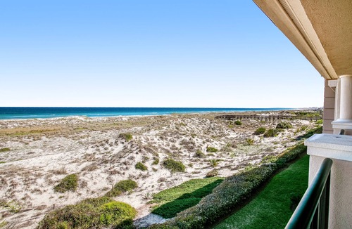 American Beach House | Tranquil coastal home with ocean views, beach access, balcony & shared pool