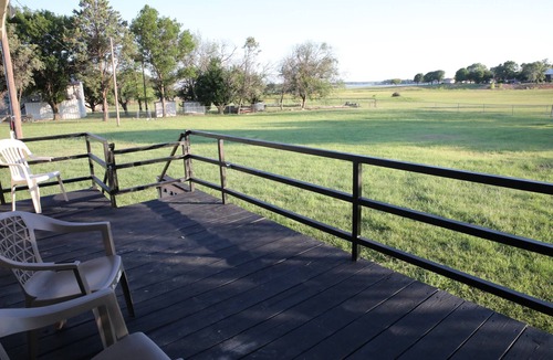 Eastland House | Tranquil Lake House on 2 Acres: Pet-Friendly with Stunning Lake Views.