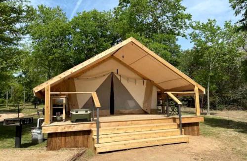 Bastrop House | Tranquil Lakefront Glamping Safari Tent with Scenic Views near Bastrop, Texas