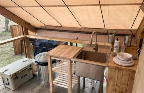 Bastrop House | Tranquil Lakefront Glamping Safari Tent with Scenic Views near Bastrop, Texas