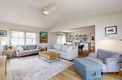Suttons Bay House | Tranquil Lakeview Retreat in Suttons Bay, with a private sauna, & large yard