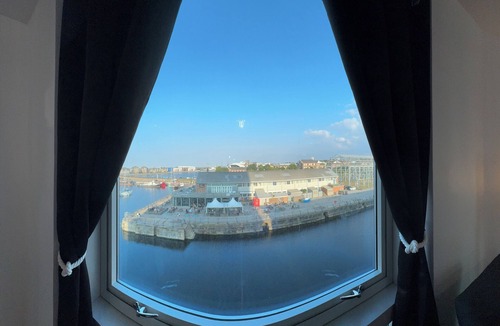 Chatham Apartment | Tranquil Oasis surrounded by restaurants, shops, bars, and a multiplex cinema.