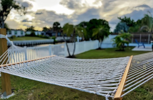 Cove House | Tranquil Pool Home with canal access and amazing amenities!