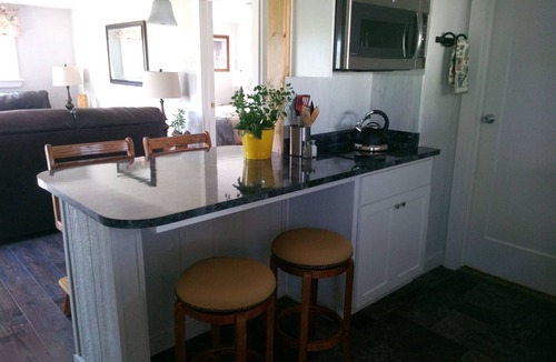 Phoenix Cottage | Tranquil setting surrounded by panoramic mountain views, grazing horses