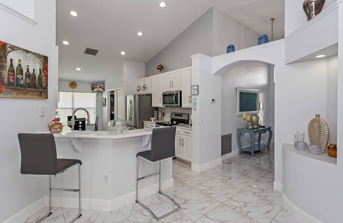 Eagle Pointe South House | Tranquil Times: Theater, Heated pool, Outdoor BBQ 6 miles from Disney