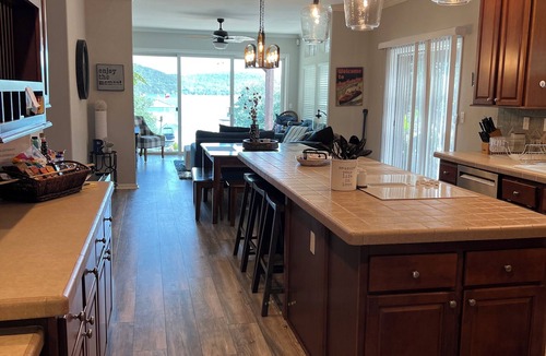 Graham House | Tranquil Waterfront property with a pool, hot tub, fire-pit & large patio.