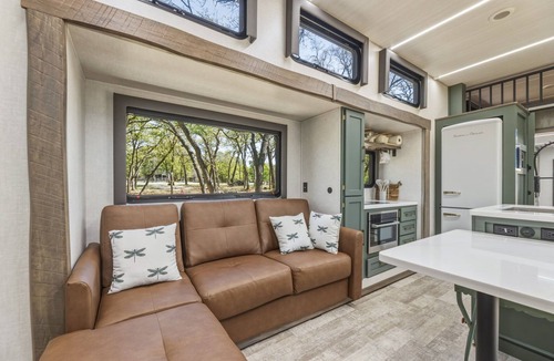 StarCrest Estates House | Travel Trailer at the Water w Easy Access, Hot Tub, Grill, 2-Tier Deck